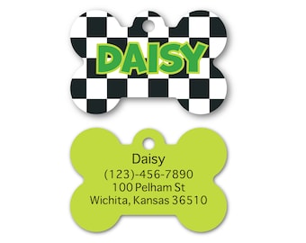 May include: A green and black checkered bone-shaped dog tag with the name "Daisy" in green letters. The back of the tag has the name "Daisy" and contact information: (123)-456-7890, 100 Pelham St, Wichita, Kansas 36510.