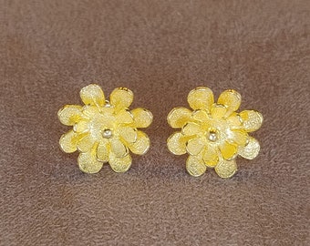 Small earrings with large flower, small flower inside