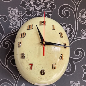 Wall clock made from an old fireman&#39;s helmet