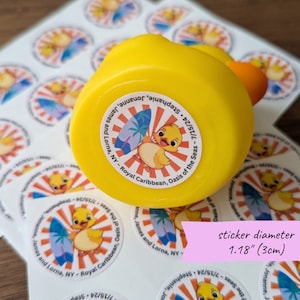 Photo of a rubber duck with the 3cm cruising duck tag sticker on the bottom.