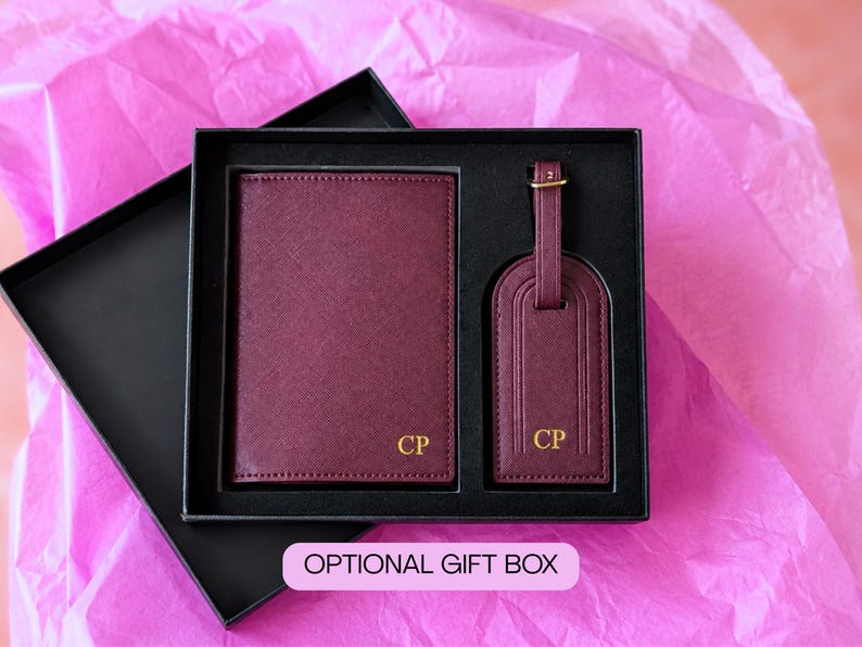 Set of burgundy passport book and luggage tag with gold initials CP in a black gift box. Also comes in black, navy, khaki, brown, dark green, purple, pink, blue and blush. Comes with optional gift box set.