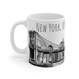 May include: White ceramic mug with a black and white illustration of the Brooklyn Bridge and the text "NEW YORK, NY" printed on the side.