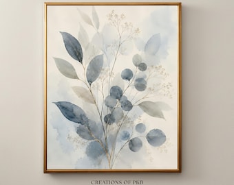 May include: A framed wall art print featuring a watercolour illustration of botanical foliage in shades of dusty blue, slate, and soft grey. The artwork displays delicate leaves and thin, branching stems against a cream background. Text reads CREATIONS OF PKB.