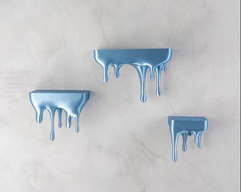 Conjunto de 3 prateleiras flutuantes de parede com design moderno e minimalista para jogos.