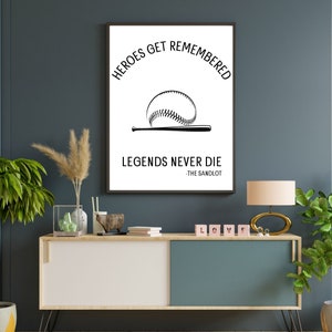 May include: Black and white print with a baseball and bat graphic. The text reads "Heroes get remembered, Legends never die - The Sandlot".