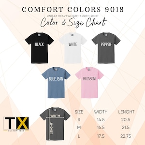 May include: Image of a Comfort Colors 9018 unisex heavyweight youth shirt color and size chart. The chart displays shirts in black, white, pepper, blue jean, and blossom colors. Size, width, and length measurements are provided in inches.