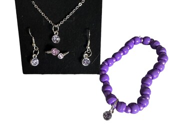 4 pc jewelry set with necklace, earrings, bracelet and ring in purple