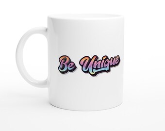May include: White ceramic coffee mug with a colorful graphic that says "Be Unique".