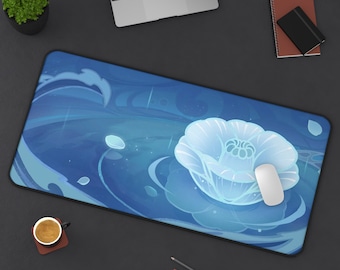 May include: A blue and white mousepad with a stylized flower design. The flower is light blue and has a white center. The mousepad has a dark blue border.