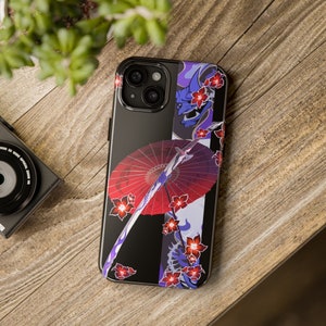 May include: Black phone case with a red and blue Japanese-inspired design featuring a sword, an umbrella, and cherry blossoms.