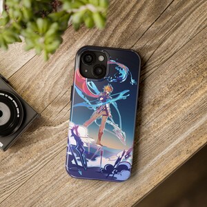 May include: A phone case with a blue and purple design featuring a character with blonde hair and a sword. The character is standing on a cloud with a blue and purple background.
