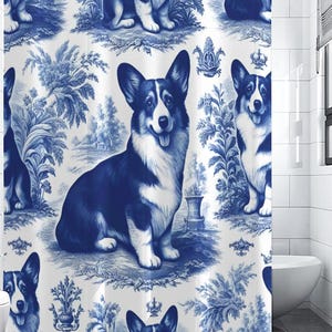 May include: A blue and white shower curtain with a repeating pattern of Corgi dogs in a toile design. The dogs are shown in a classic, seated pose, surrounded by floral and landscape elements. The curtain adds a touch of whimsy to any bathroom.