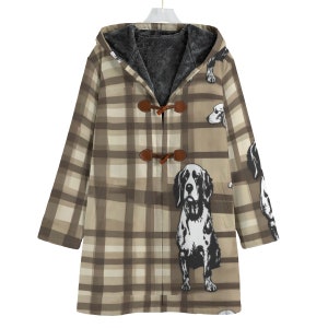 May include: A brown and white plaid hooded coat with a black and white dog print. The coat has a brown toggle closure and a fleece lining.