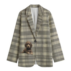 May include: A gray and beige plaid blazer with a brown puppy dog embroidered on the left chest pocket.