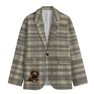 May include: A beige blazer with a brown and white plaid pattern. A brown dog is embroidered on the left pocket.