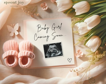 May include: A pink and white baby announcement card with the text "Baby Girl Coming Soon..." and a sonogram image. The card is surrounded by white tulips, pink flowers, and a pair of pink knitted baby booties.