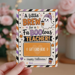 May include: A rectangular Halloween-themed gift card holder featuring a white ghost wearing a purple beanie and holding a coffee cup. The text reads A Little BREW for a FaBOOlous TEACHER! with a designated orange box labeled GIFT CARD HERE.
