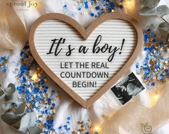 May include: A heart-shaped announcement board with the text "It's a boy! LET THE REAL COUNTDOWN BEGIN!" surrounded by blue and gold confetti. An ultrasound image is also included.