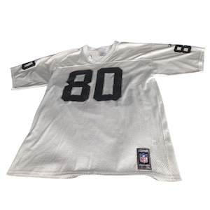 Pode incluir: Camisola de futebol americano da NFL branca com o número 80 em preto na frente e nas mangas. A camisola tem decote em V e um design em malha. As etiquetas NFL e XL são visíveis.