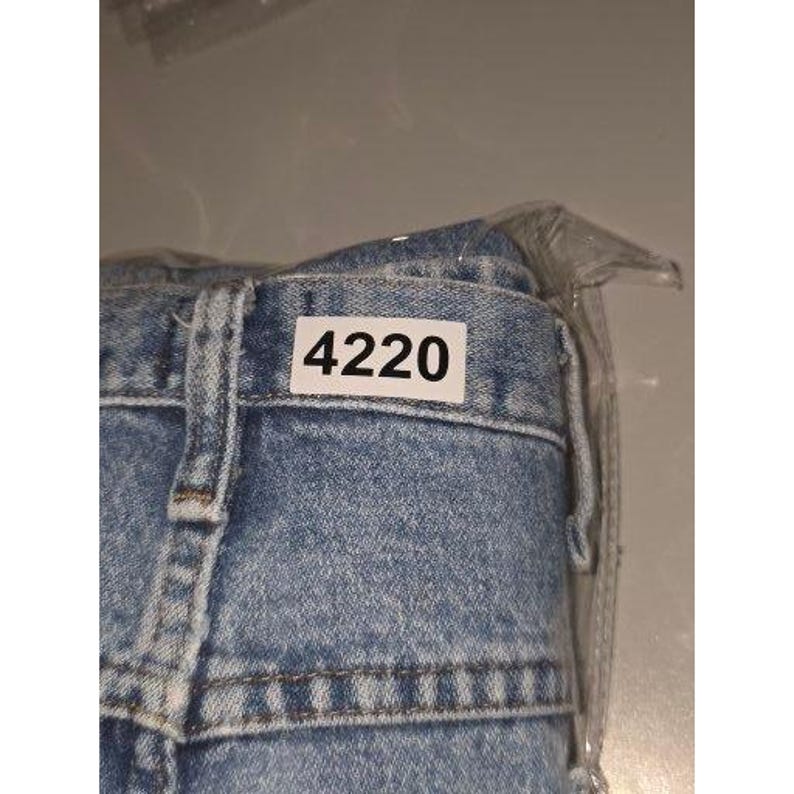 Calça jeans vintage Wrangler masculina, lavagem clara, corte slim, tamanho 36x32, azul, para trabalho e estilo western. imagem 12