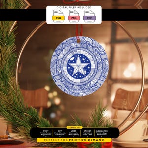 May include: A circular ornament featuring a blue and white intricate mandala-style pattern with a central five-pointed star. The design includes a red hanging ribbon. Text at the top reads DIGITAL FILES INCLUDED with SVG, PNG, and PDF icons.