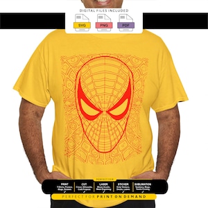 May include: A bright yellow short-sleeved t-shirt featuring a red graphic of a superhero mask with a web-like pattern. The design includes the text DIGITAL FILES INCLUDED with SVG, PNG, and PDF icons, and a black banner labeled PERFECT FOR PRINT ON DEMAND.