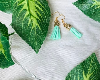 green long feathered earrings in thick strings, dangling earrings in light green with gold hooks