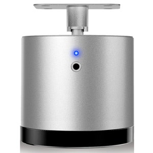 Puede incluir: Un dispositivo cilíndrico plateado con una base negra y un soporte de montaje. Cuenta con una pequeña luz azul y una abertura circular. El dispositivo parece ser de metal y está diseñado para el montaje.