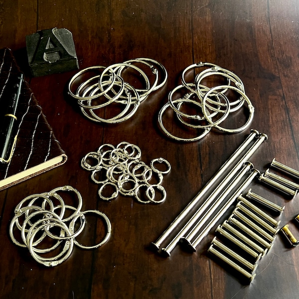 Bundles of book rings or screws; binding rings, bookbinding rings, key rings - for journals, sheets, albums, ring binder covers