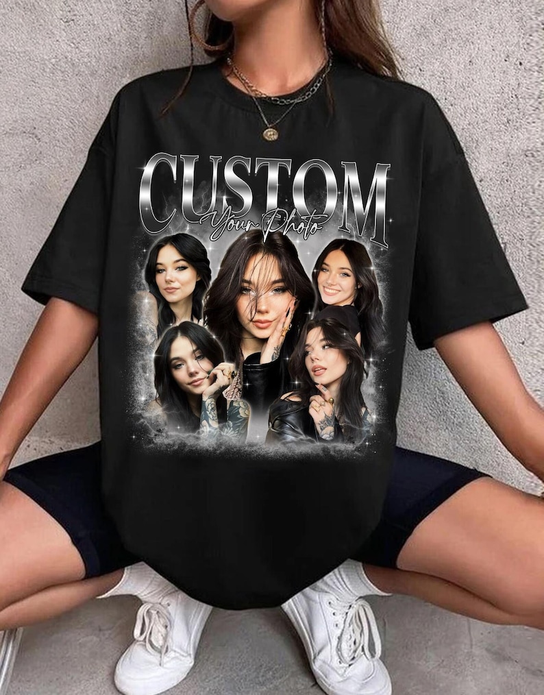May include: Black t-shirt with a silver graphic that says "CUSTOM Your Photo" and features a collage of five women's faces.