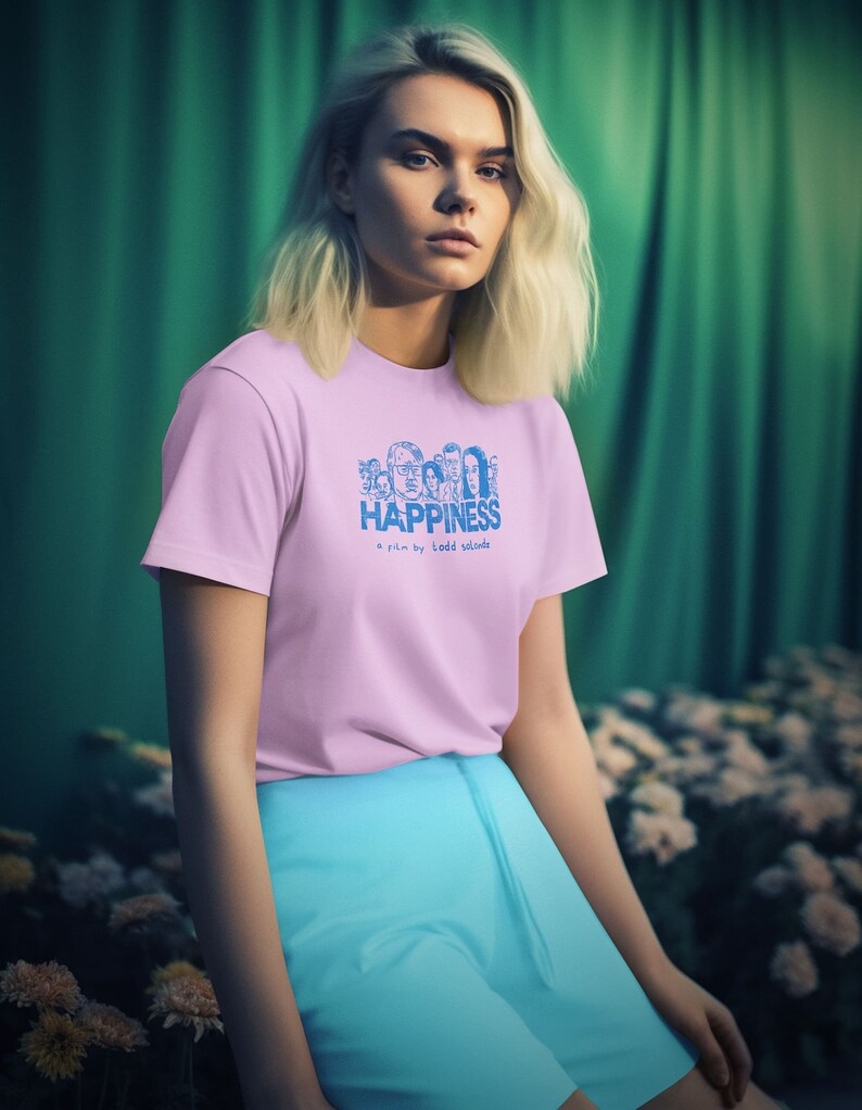 Young woman wearing a customized pink cotton T-shirt from the movie Happiness by Todd Solondz