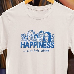 Customized white t-shirt from the movie Happiness by Todd Solondz hanging on a hanger