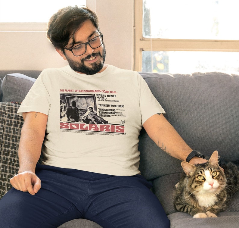 Young man wearing a customized natural cotton T-shirt from the movie Solaris  by  Tarkovski