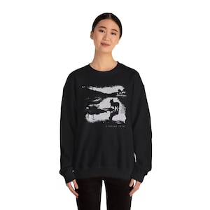 Young woman wearing a customized black cotton sweatshirt from the movie Stalker  by  Tarkovski