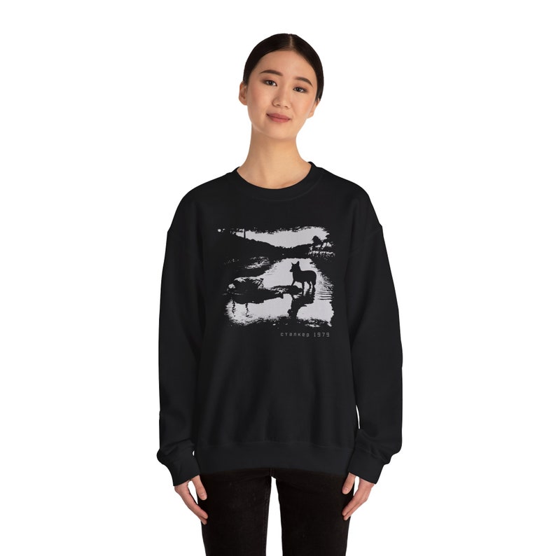 Young woman wearing a customized black cotton sweatshirt from the movie Stalker  by  Tarkovski