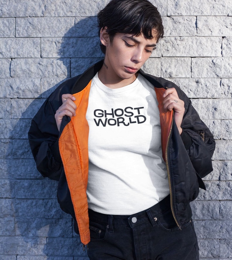 Young woman wearing a customized white cotton shirt from the movie Ghost World by Terry Zwigoff
