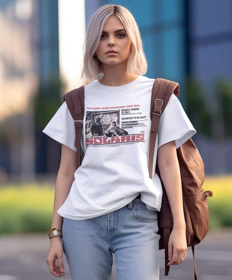 Young woman wearing a customized white cotton T-shirt from the movie Solaris by Tarkovski