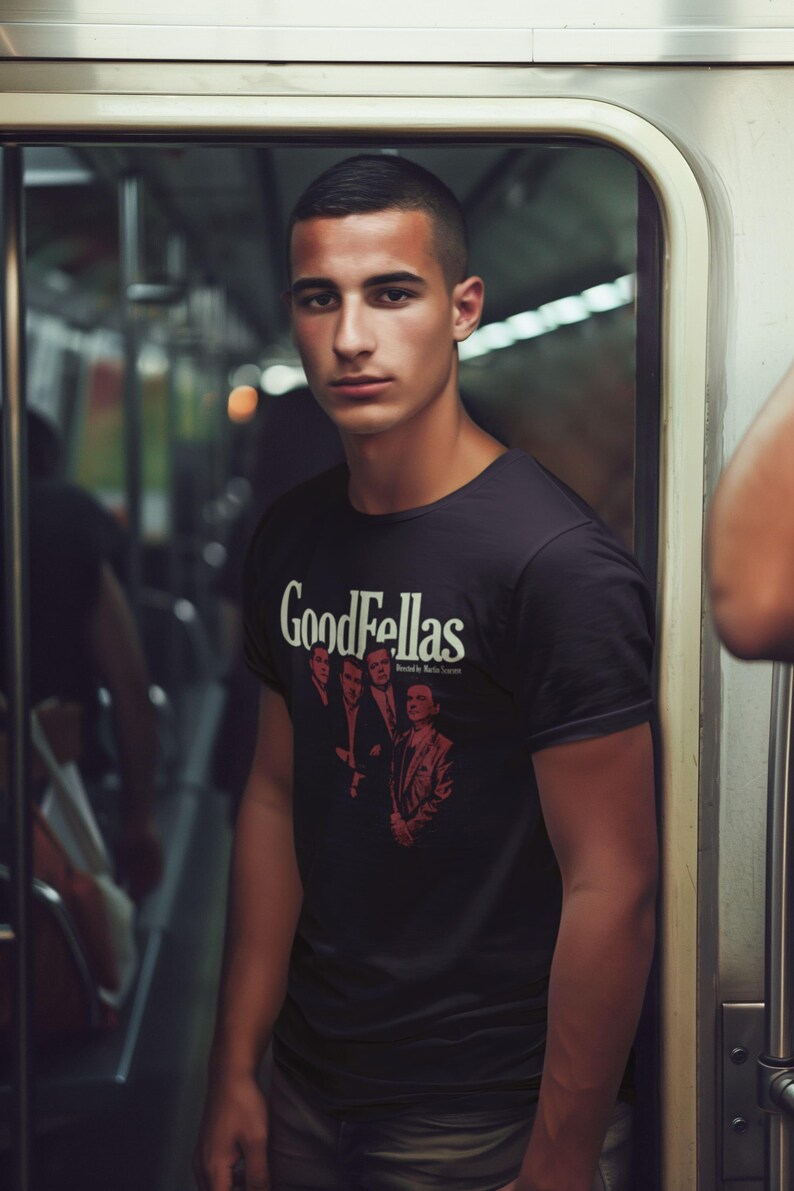 Young man wearing a customized black cotton shirt from the movie Goodfellas by Martin Scorsese