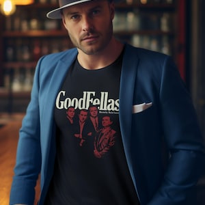 Young man wearing a customized black cotton shirt from the movie Goodfellas by Martin Scorsese