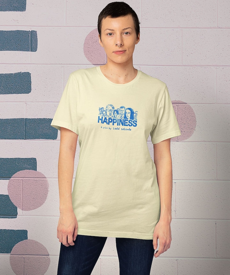 Young woman wearing a customized natural cotton T-shirt from the movie Happiness by Todd Solondz