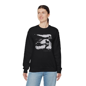 Young woman wearing a customized black cotton sweatshirt from the movie Stalker  by  Tarkovski
