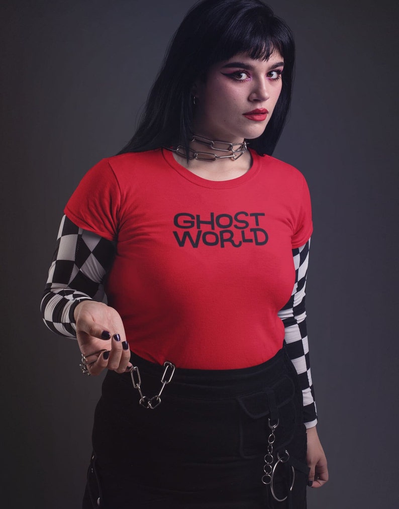 Young woman wearing a customized red cotton shirt from the movie Ghost World by Terry Zwigoff