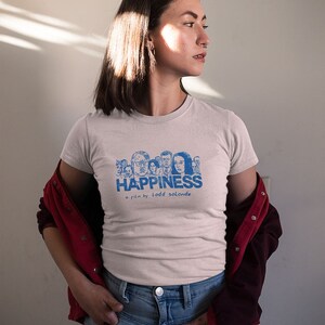 Young woman wearing a customized pink cotton T-shirt from the movie Happiness by Todd Solondz