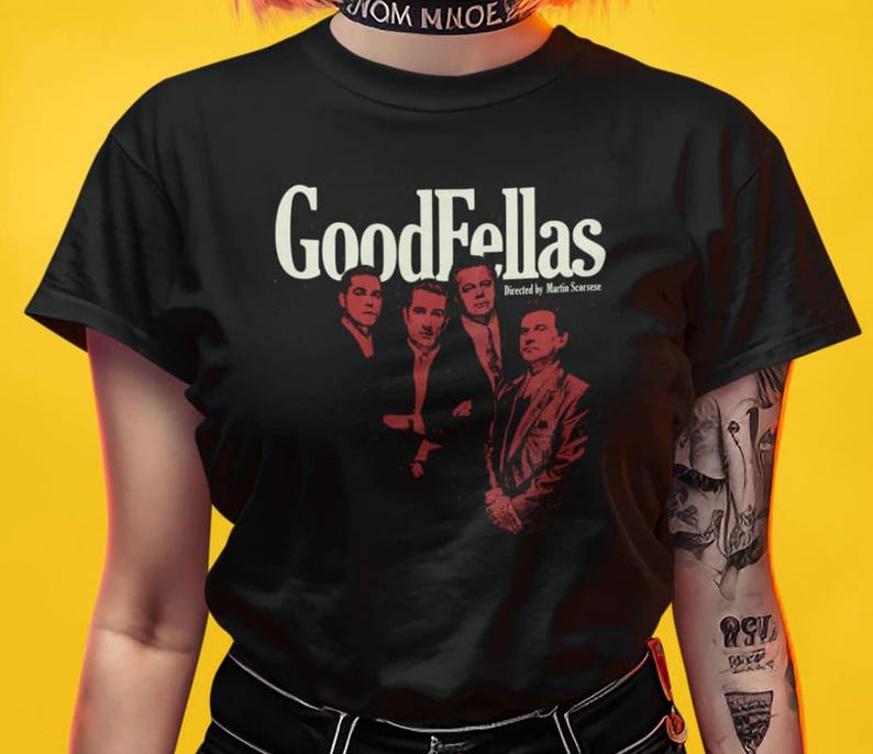 Young woman wearing a customized black cotton shirt from the movie Goodfellas by Martin Scorsese