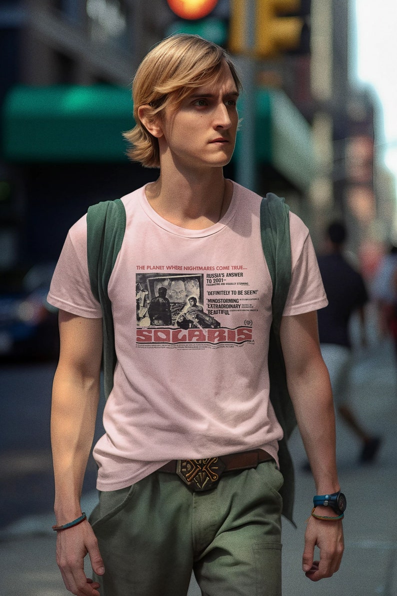 Young man wearing a customized pink cotton T-shirt from the movie Solaris  by  Tarkovski