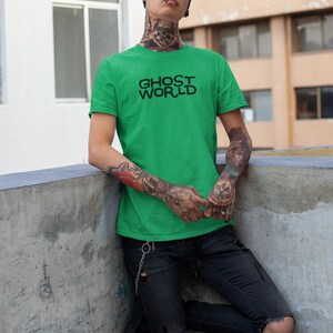 Young man wearing a customized green cotton shirt from the movie Ghost World by Terry Zwigoff