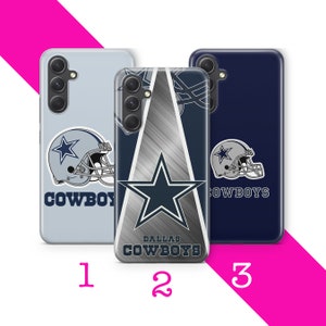 May include: Three different phone cases featuring the Dallas Cowboys logo. The first case is light blue with a white star and the words "COWBOYS" in white. The second case is silver with a blue star and the words "DALLAS COWBOYS" in black. The third case is dark blue with a white star and the words "COWBOYS" in white.