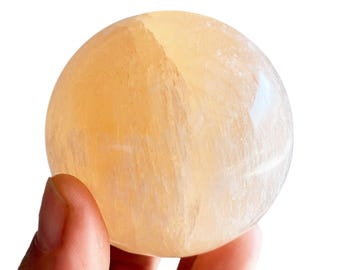 Peach Selenite Sphere 6cm from Morocco