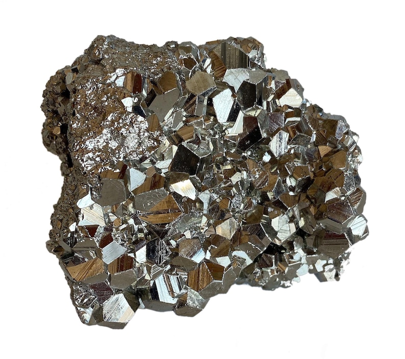 May include: A cluster of pyrite crystals, also known as fool's gold, with a metallic, reflective surface. The crystals are a mix of cubic and irregular shapes, with a dark, brassy color. The overall form is rough and textured.