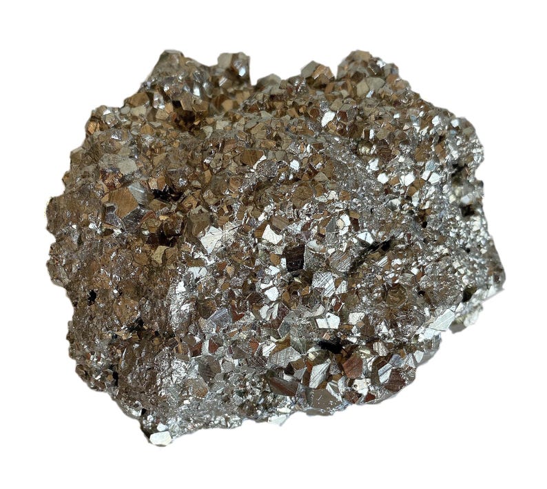 May include: A close-up of a pyrite specimen, also known as fool's gold, with a metallic, reflective surface. The mineral displays a cluster of cubic crystals, showcasing a natural, textured appearance. The color is a mix of gold and silver.